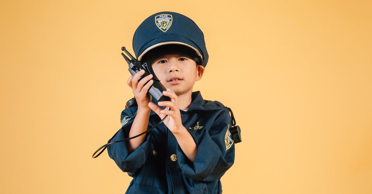 Schengen visa refused using motif 2 on purpose and conditions of stay [duplicate] - Serious Asian kid in police uniform with transceiver