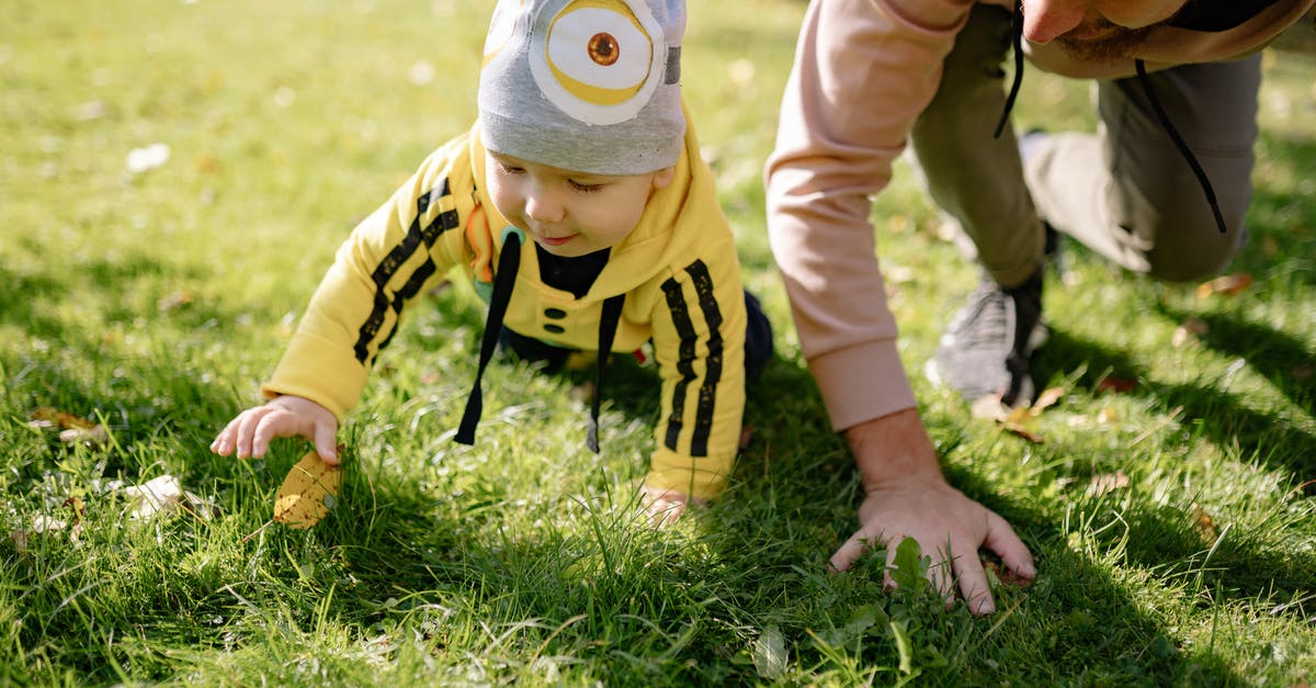 Schengen visa sponsored by my father - Child in Yellow and Black Stripe Long Sleeve Shirt and Gray Cap on Green Grass Field Schengen visa sponsored by my father - Child in Yellow and Black Stripe Long Sleeve Shirt and Gray Cap on Green Grass Field