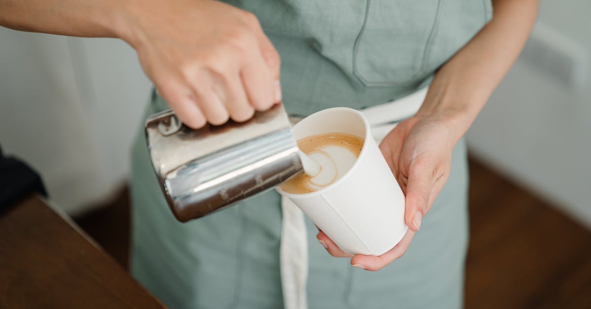 schengen visa taking to much processing time - Crop barista pouring milk froth in cappuccino for client schengen visa taking to much processing time - Crop barista pouring milk froth in cappuccino for client