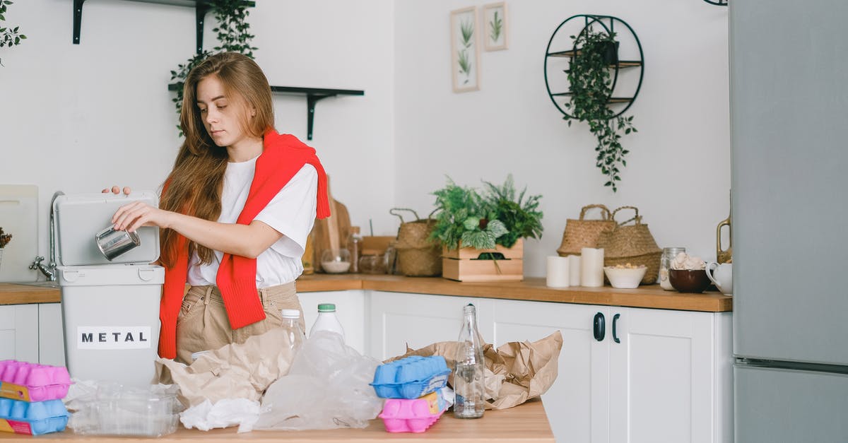 Schengen visa used in non-EU country can it be reused in EU? - Young responsible female standing in kitchen and putting tin can into bucket while sorting trash Schengen visa used in non-EU country can it be reused in EU? - Young responsible female standing in kitchen and putting tin can into bucket while sorting trash