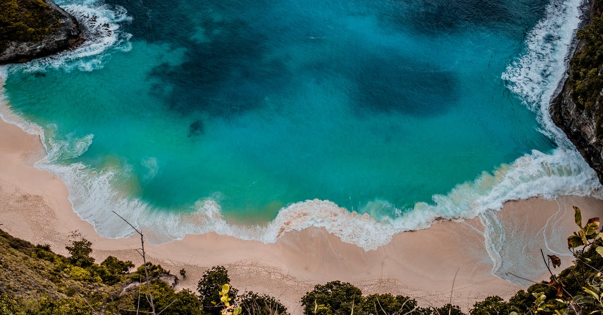 Seaplane from Bali to Rinca? - High Angle Photo of Beach Seaplane from Bali to Rinca? - High Angle Photo of Beach