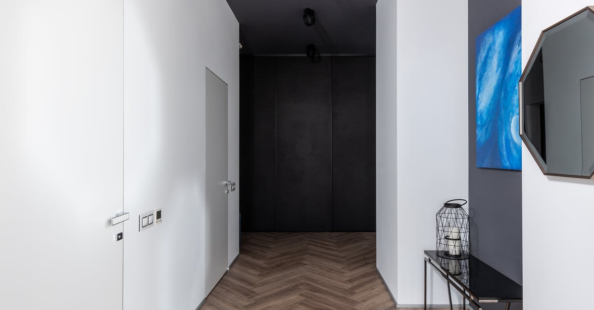 Searching for flights to "Anywhere" in narrow time frame - Modern corridor with doors and decorations Searching for flights to "Anywhere" in narrow time frame - Modern corridor with doors and decorations