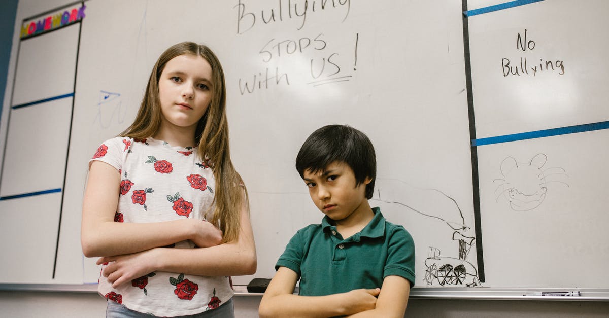 Secondary school in the US just for one month - Two Students Looking Angry at the Camera Secondary school in the US just for one month - Two Students Looking Angry at the Camera