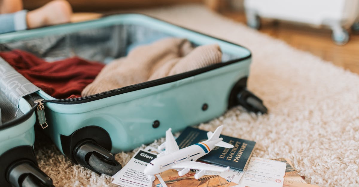 Send luggage to a pick-up point and retrieve after 2 weeks - Black and Green Luggage Bag on Brown Carpet Send luggage to a pick-up point and retrieve after 2 weeks - Black and Green Luggage Bag on Brown Carpet