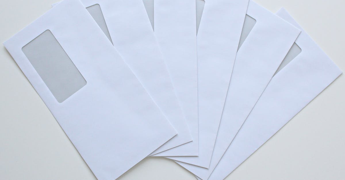 Sending a letter to Manila/Philippines to be picked up at the post office (Poste Restante) - High Angle View of Paper Against White Background Sending a letter to Manila/Philippines to be picked up at the post office (Poste Restante) - High Angle View of Paper Against White Background