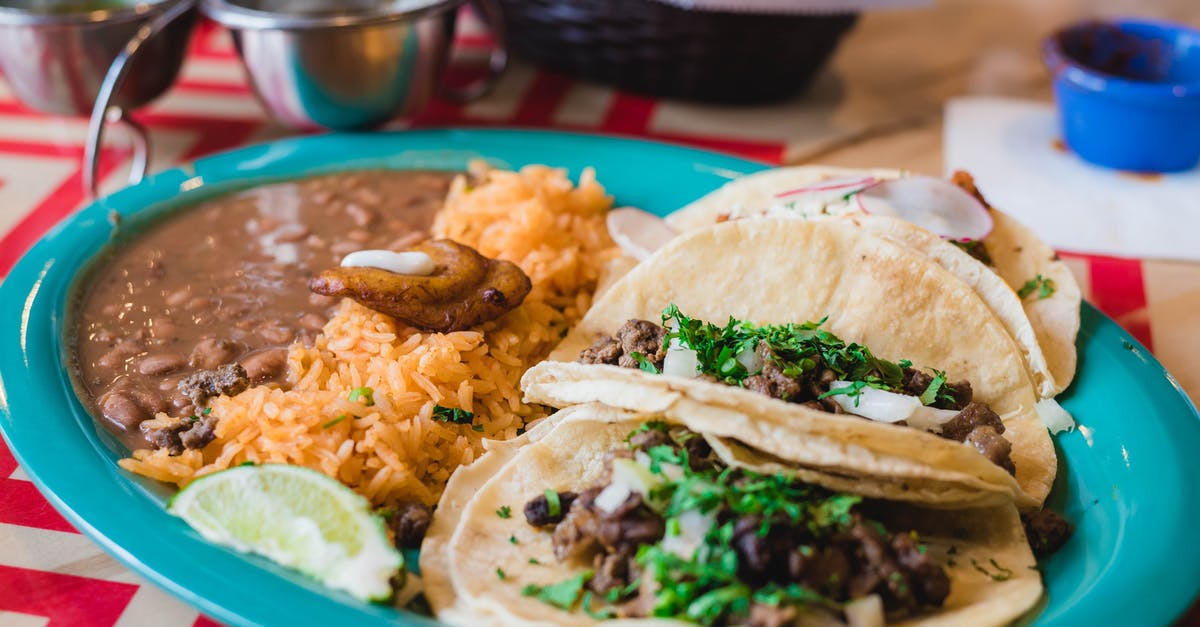 SEVIS completed (graduated) may be terminated [closed] - Close-Up Photo of Rice and Tacos