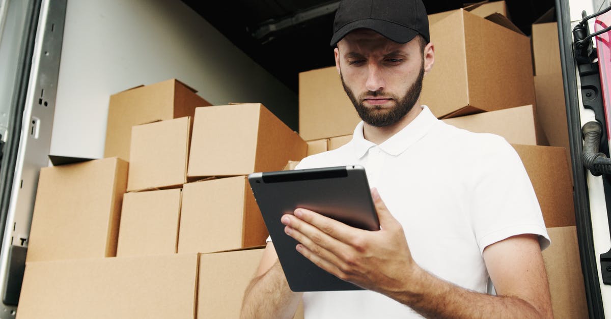 Shipping Labels not received for round trip courier service for UK Visa using VFS Global - Man in White Polo Shirt Using a Tablet Computer Shipping Labels not received for round trip courier service for UK Visa using VFS Global - Man in White Polo Shirt Using a Tablet Computer