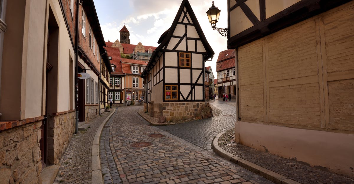 Short term schengen Visa to Germany refused twice due to lack of subsistence - Brown and White Concrete Houses Under White Clouds