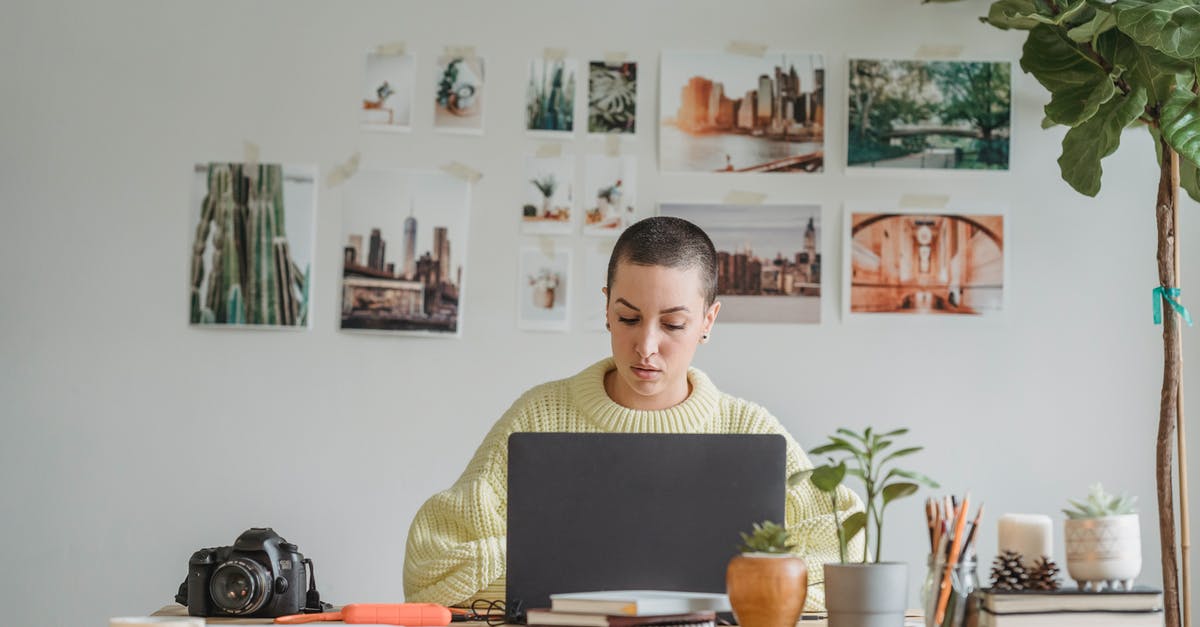 Short term study visa - using property sale as proof of funds - Concentrated woman working on laptop in office
