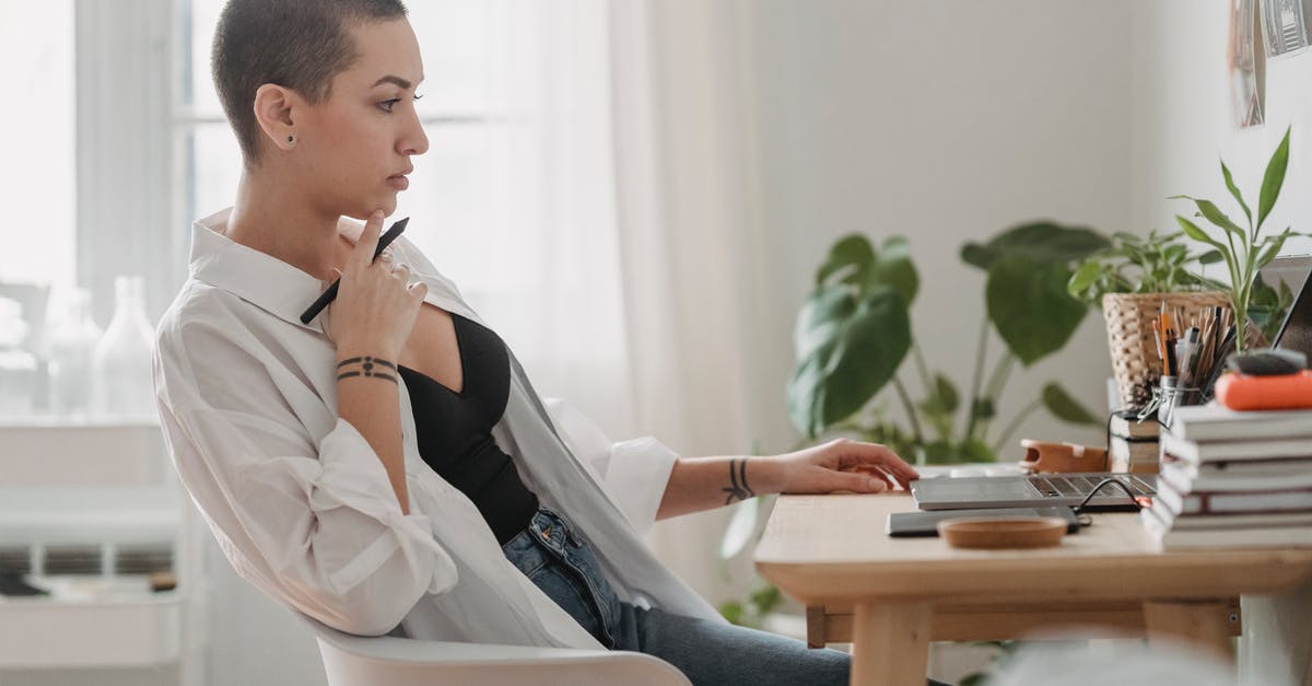 Short term study visa - using property sale as proof of funds - Pensive woman working on laptop at desk