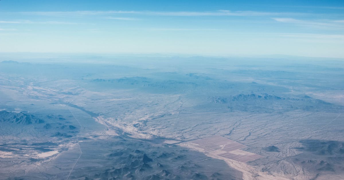 Shortest transatlantic flight from Europe to somewhere, so that continental US can be reached by land (with possible ferry) - Aerial Photography of Mountains and River