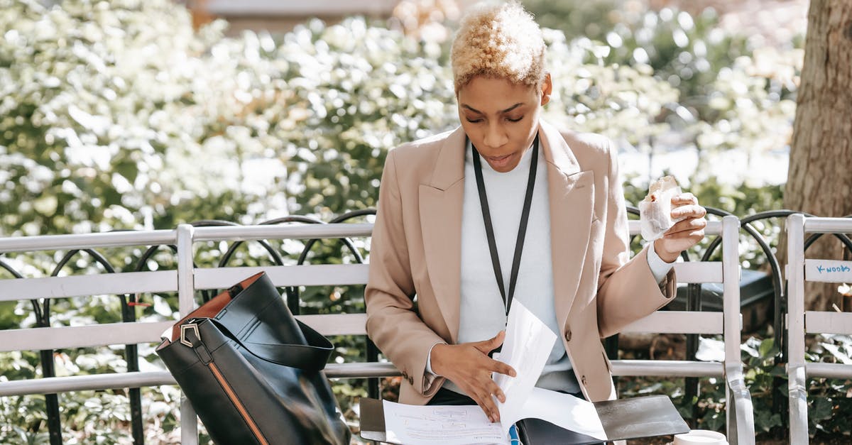Should a student carry a sleeping bag with himself when going abroad? [closed] - Serious ethnic woman turning documents