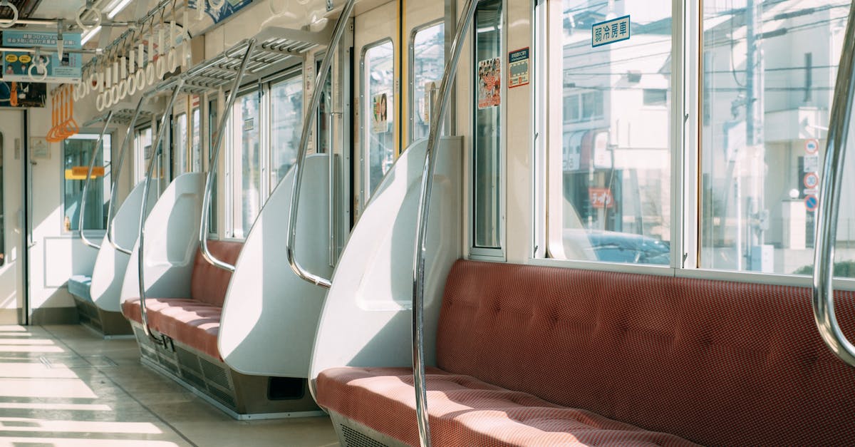 Should I book Thailand Rail tickets online (pre-trip) or at the station when I arrive? - Empty contemporary train in city on sunny day Should I book Thailand Rail tickets online (pre-trip) or at the station when I arrive? - Empty contemporary train in city on sunny day