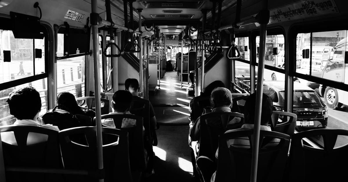 Should I make bus reservations in Mexico in early spring? - Grayscale Photo Of People Sitting Inside A Bus Should I make bus reservations in Mexico in early spring? - Grayscale Photo Of People Sitting Inside A Bus