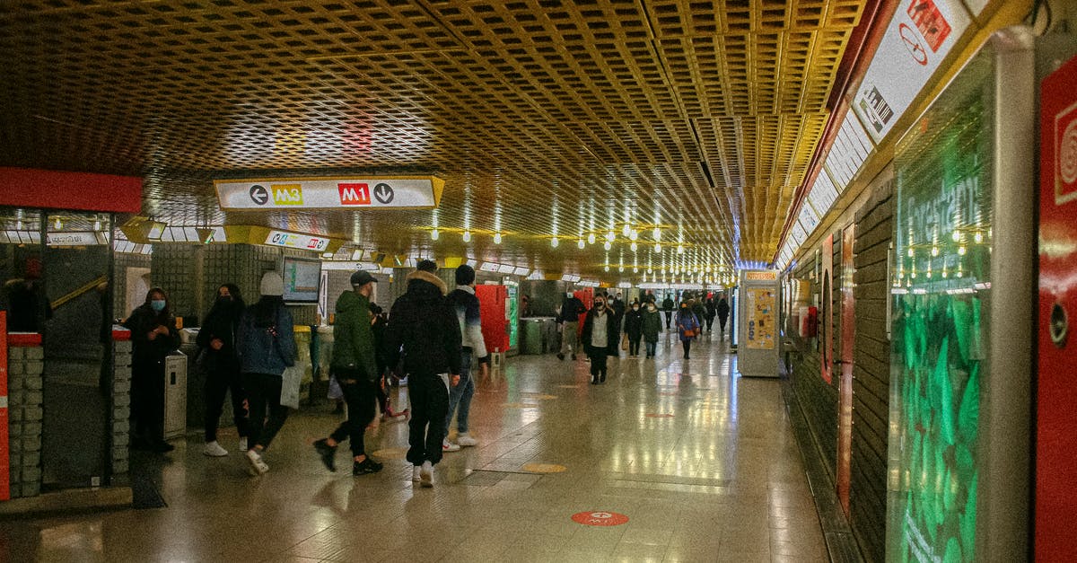 Should I purchase train tickets between Milan Malpensa Airport and Florence on the day or book them in advance? - People Walking on Train Station Should I purchase train tickets between Milan Malpensa Airport and Florence on the day or book them in advance? - People Walking on Train Station
