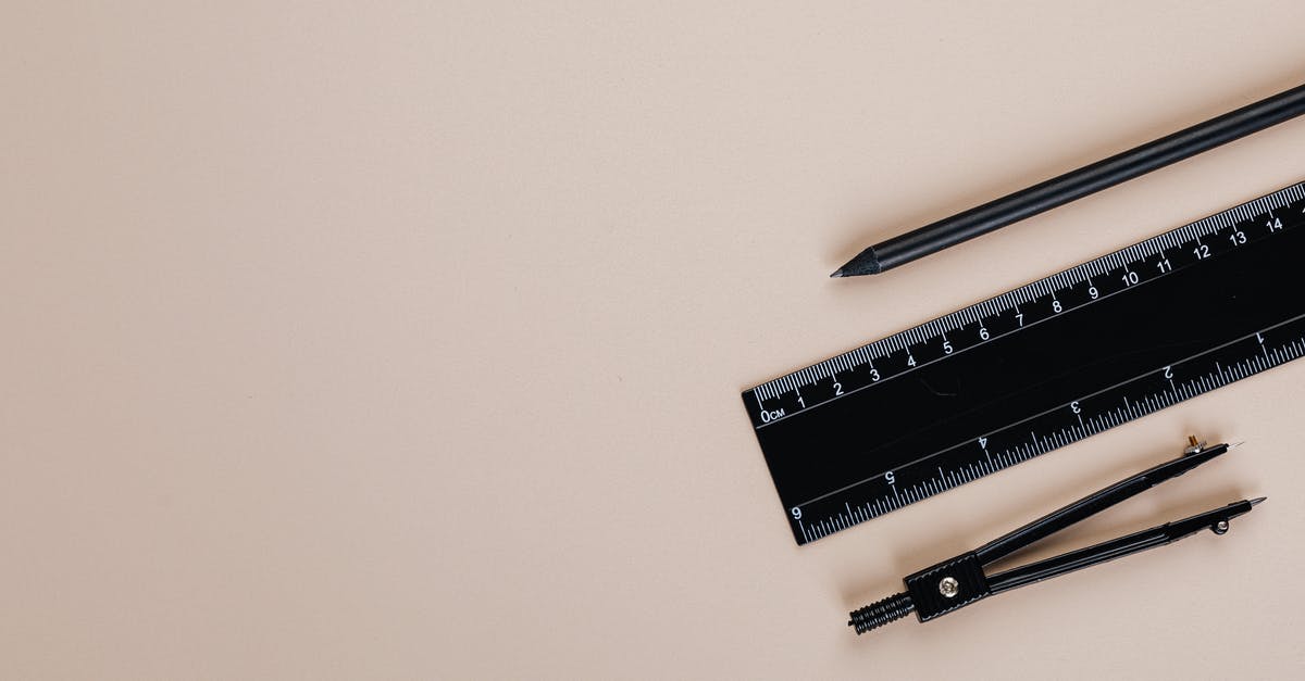 Should I put a compass in carry-on or checked luggage? - Black and Silver Ballpoint Pen on White Table Should I put a compass in carry-on or checked luggage? - Black and Silver Ballpoint Pen on White Table