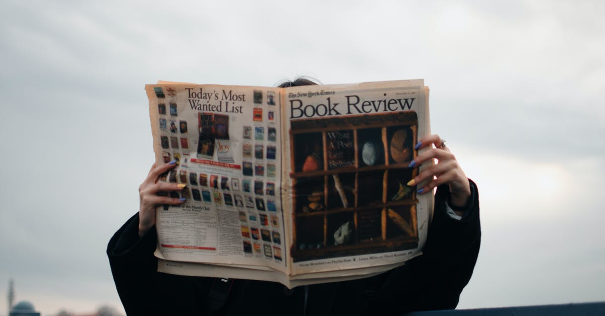 Should I update information after Kenyan visa was granted? - Person Holding White and Brown Newspaper Should I update information after Kenyan visa was granted? - Person Holding White and Brown Newspaper