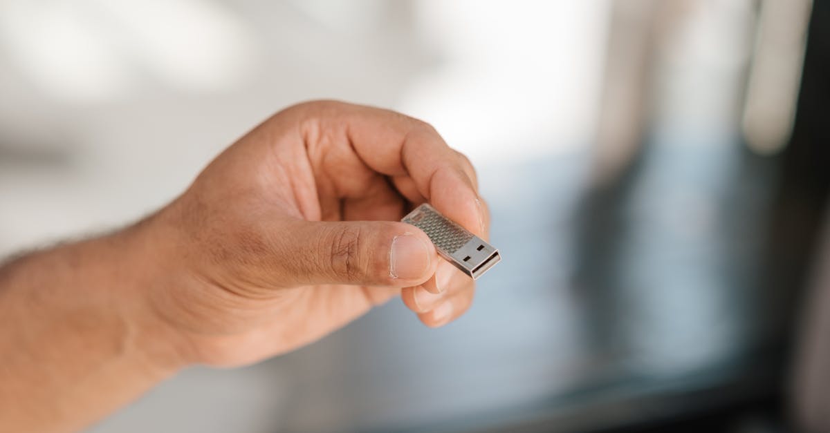 Showing evidence for informal savings - Man with small modern device for storage and transfer information Showing evidence for informal savings - Man with small modern device for storage and transfer information