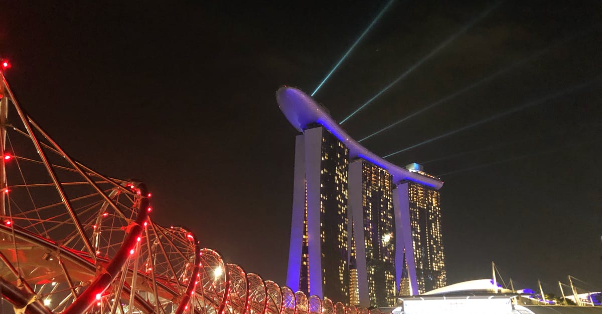 Singapore airport to hotel late at night - Gray and Whtie Building Scenery Singapore airport to hotel late at night - Gray and Whtie Building Scenery
