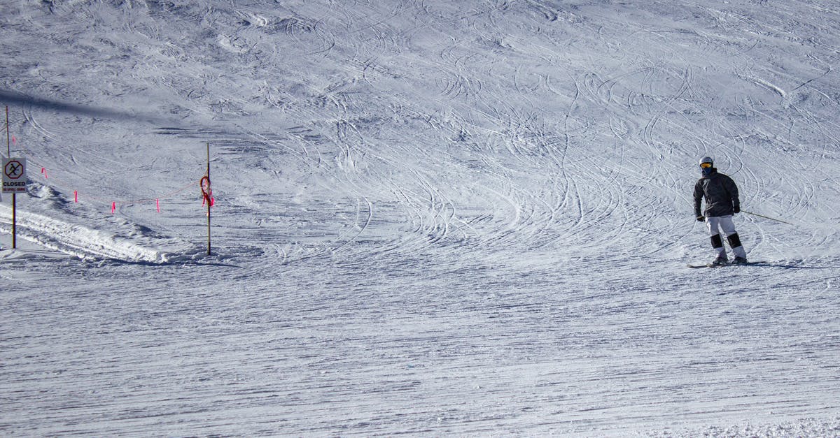 Skiing near Frankfurt 18-23 February - Person in Red Jacket and Black Pants Standing on White Snow Covered Ground Skiing near Frankfurt 18-23 February - Person in Red Jacket and Black Pants Standing on White Snow Covered Ground