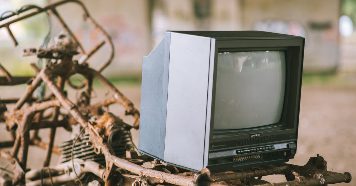 Small historical stone bridge in the North of Seoul - Retro TV set on rusty structure Small historical stone bridge in the North of Seoul - Retro TV set on rusty structure