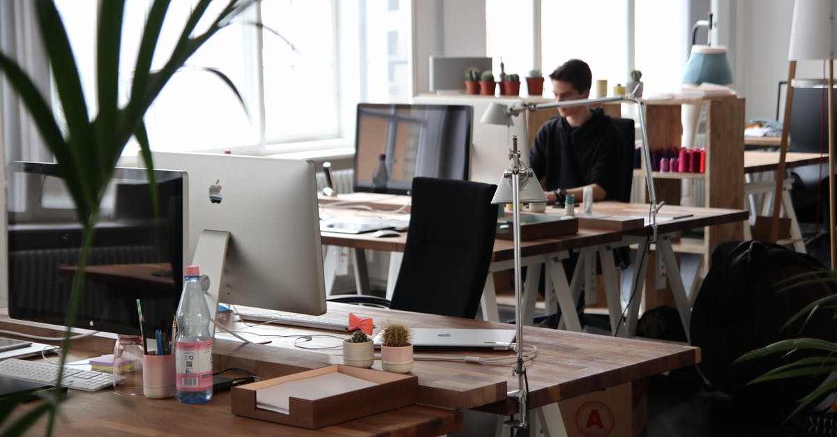 Sole employee of US company. Any issues working remotely in Peru on tourist visa? - Man Sitting in Front of Computer Sole employee of US company. Any issues working remotely in Peru on tourist visa? - Man Sitting in Front of Computer