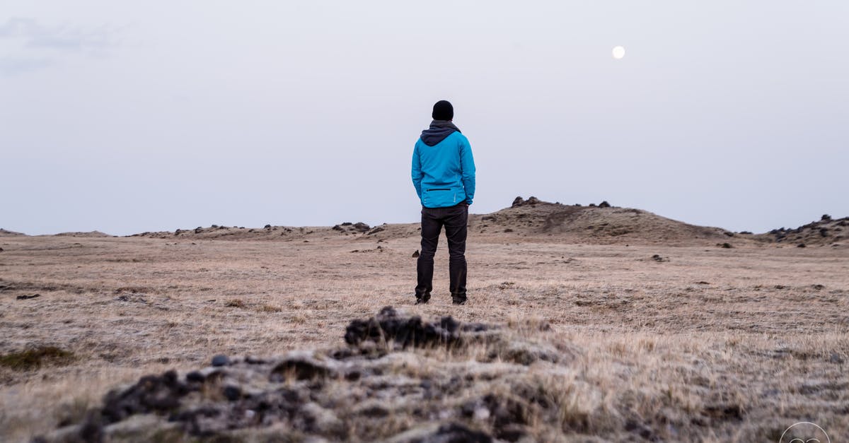 Solo travelling EU at 17 - Man in Blue Hoodie Standing on Brown Grass Solo travelling EU at 17 - Man in Blue Hoodie Standing on Brown Grass