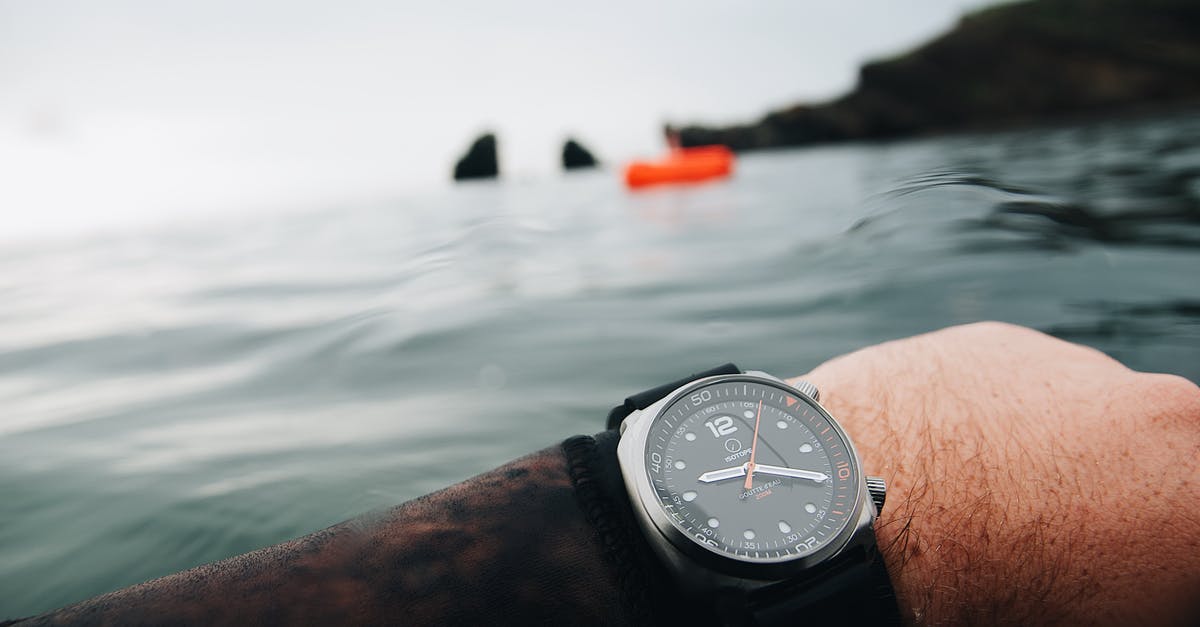 Standard Visitor visa refused (V4.2) for the second time - Person Wearing Silver Round Analog Watch