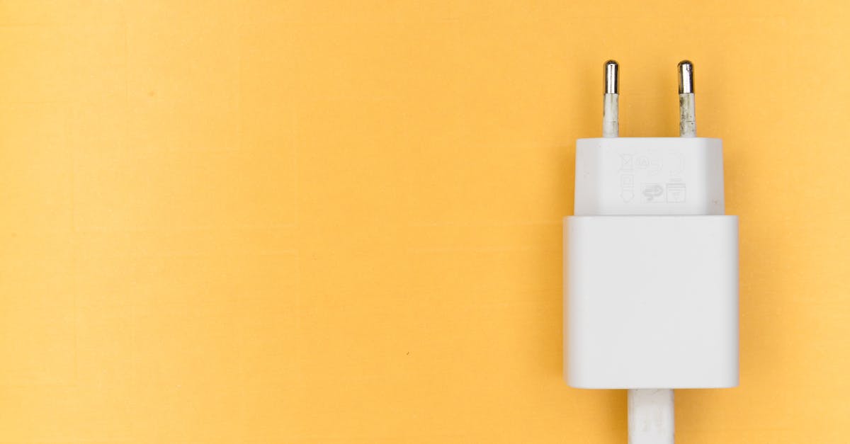 Stansted Airport USB Charging Outlets - Mobile Adapter on Yellow Surface Stansted Airport USB Charging Outlets - Mobile Adapter on Yellow Surface