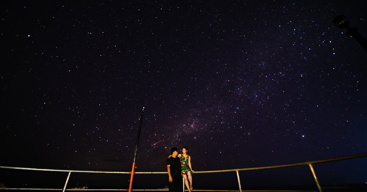 Star Alliance programme with free expiry date extension - Couple embracing against starry sky at night Star Alliance programme with free expiry date extension - Couple embracing against starry sky at night
