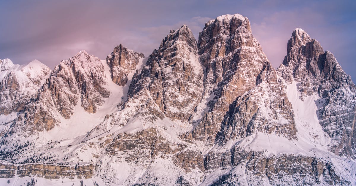 Status of David Gareja - rocky monastery on the top of the mountain - Scenic View of Snowy Mountain