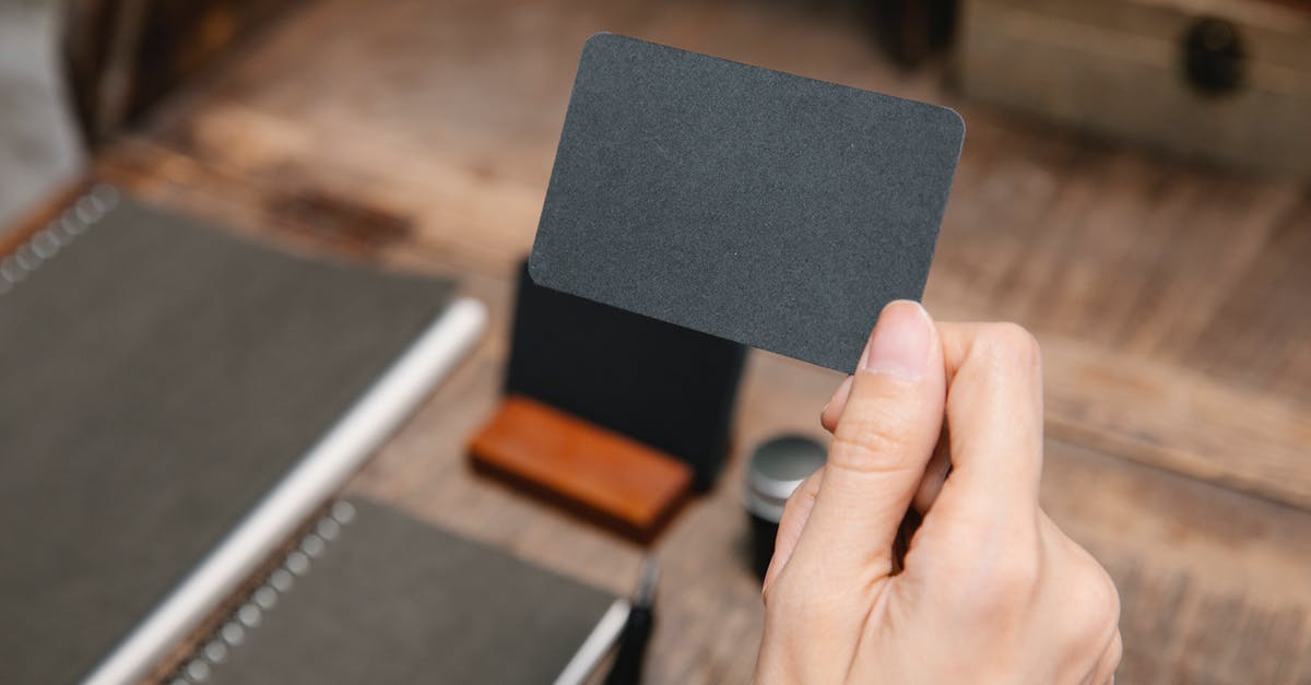 Stockholm: to Arlanda on an SL card - Close Up Photo of Person Holding a Black Card Stockholm: to Arlanda on an SL card - Close Up Photo of Person Holding a Black Card