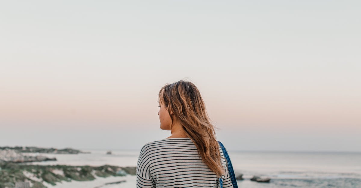 Strongest travel sunblock? - Woman in Black and White Striped Long Sleeve Shirt Standing on Beach Strongest travel sunblock? - Woman in Black and White Striped Long Sleeve Shirt Standing on Beach