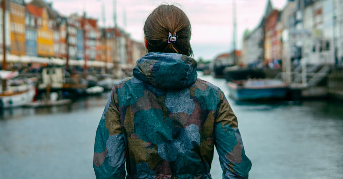 Submitted for Sweden visa to Denmark embassy want to get the passport back for emergency travel - Woman Beside River Between Buildings Submitted for Sweden visa to Denmark embassy want to get the passport back for emergency travel - Woman Beside River Between Buildings