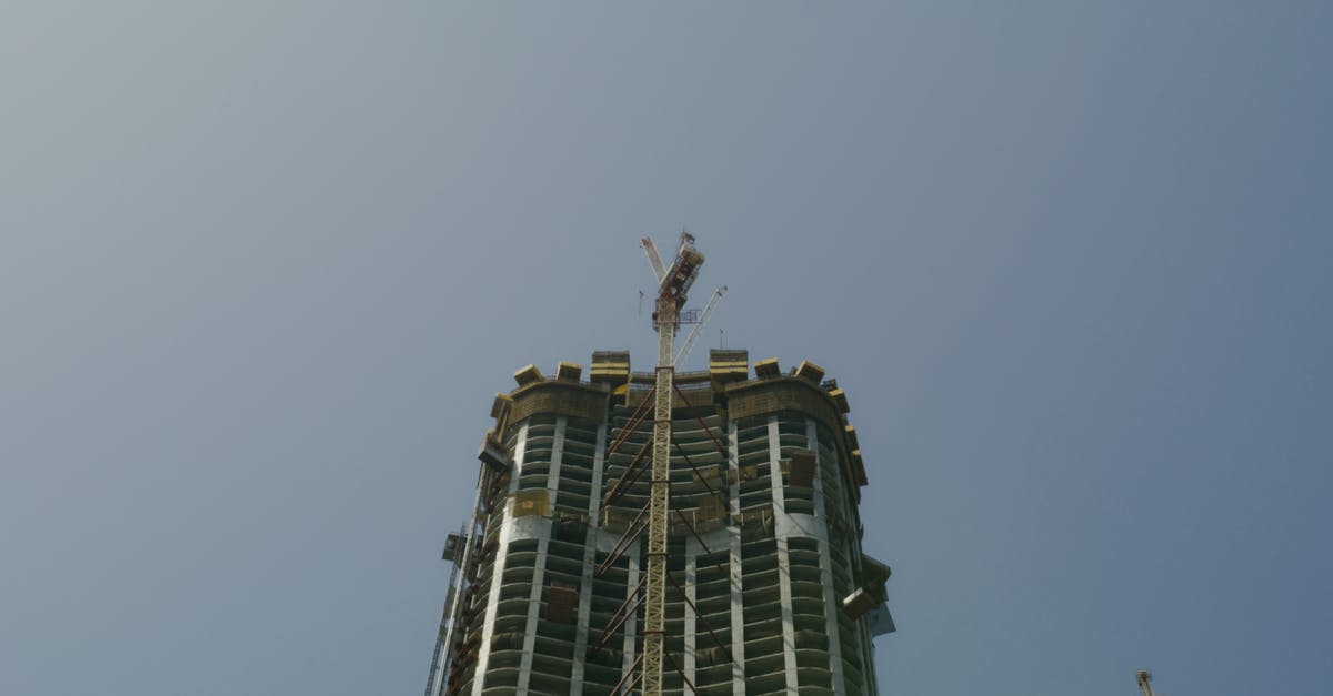 Supercars in Dubai - White and Black Concrete Building Supercars in Dubai - White and Black Concrete Building