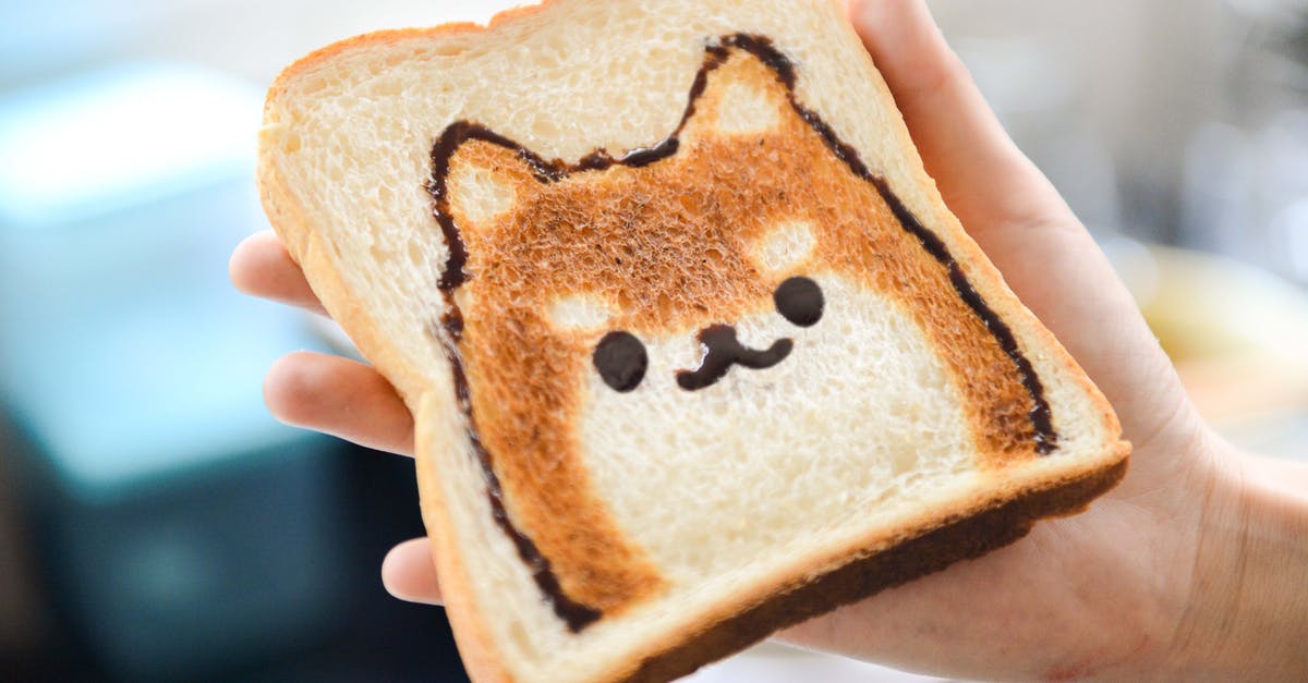 Sweet Egyptian bread? - Slice of Loaf Bread With Dog Face Sweet Egyptian bread? - Slice of Loaf Bread With Dog Face
