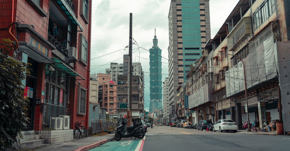 Taiwan maximum stay -- on landing or passing immigration? - Cars on Road Between High Rise Buildings Taiwan maximum stay -- on landing or passing immigration? - Cars on Road Between High Rise Buildings