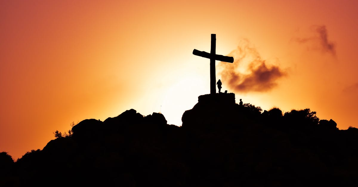 Taizé prayer in Bucharest: where? - Human Standing Beside Crucifix Statue on Mountain Taizé prayer in Bucharest: where? - Human Standing Beside Crucifix Statue on Mountain