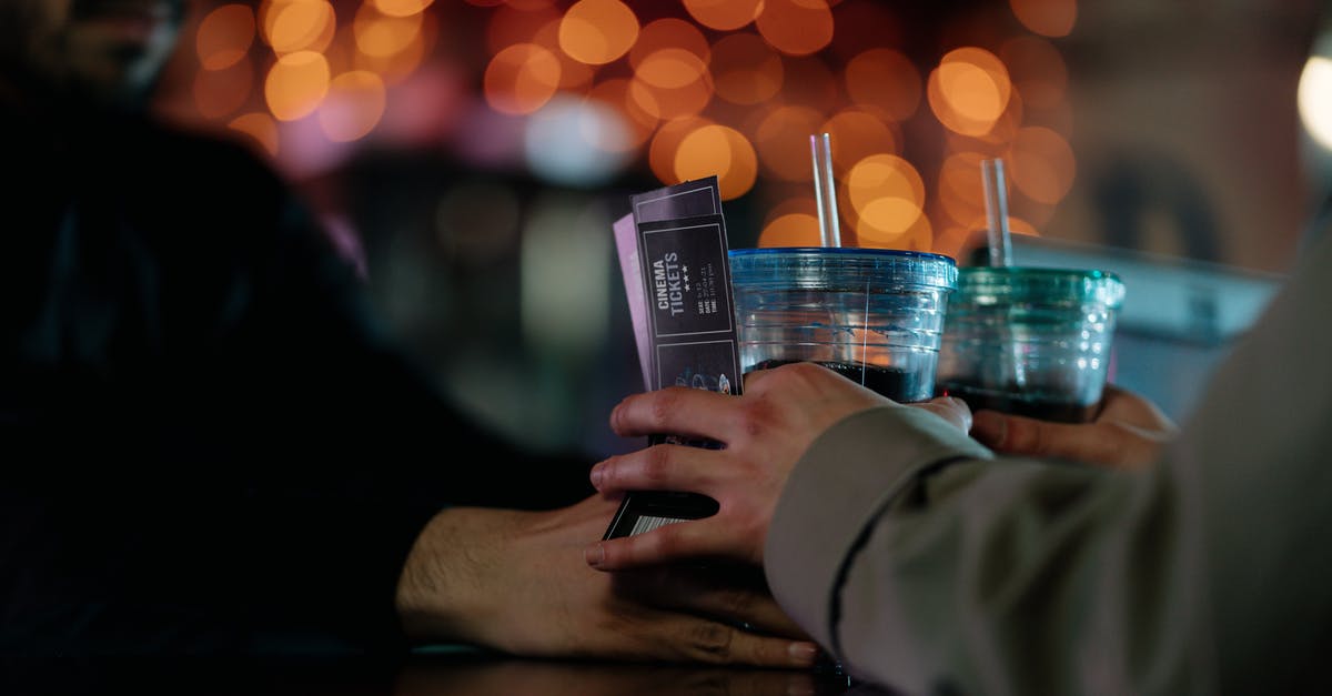 Tegelbergbahn Tickets - A Bearded Man Handing Out a Couple of Drinks to a Person Holding Cinema Tickets Tegelbergbahn Tickets - A Bearded Man Handing Out a Couple of Drinks to a Person Holding Cinema Tickets