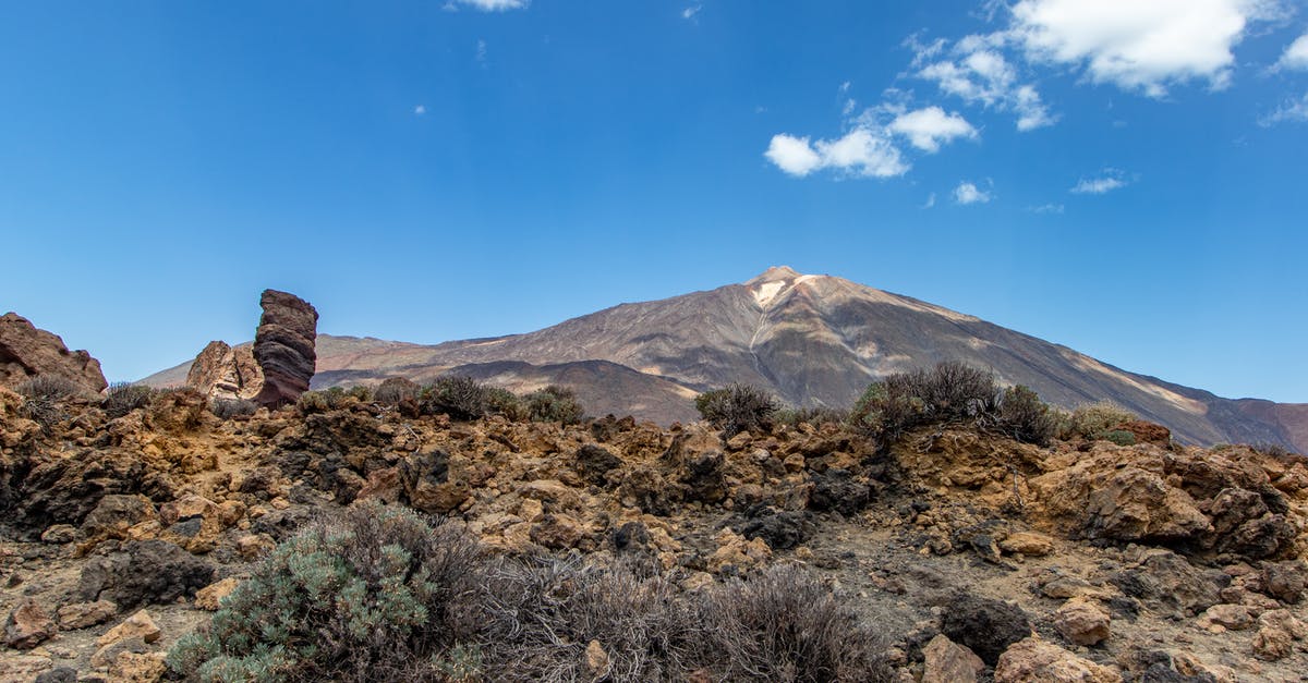 Tenerife South Airport to Teide - Brown Mountain Under Blue Sky Tenerife South Airport to Teide - Brown Mountain Under Blue Sky
