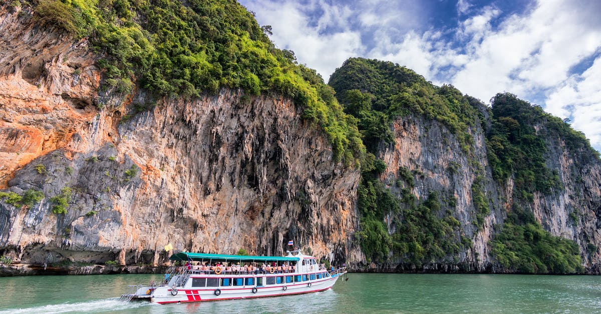 Thailand coup: What extent of disruption should tourists expect? - People on Ship Traveling on Water Beside Land Thailand coup: What extent of disruption should tourists expect? - People on Ship Traveling on Water Beside Land
