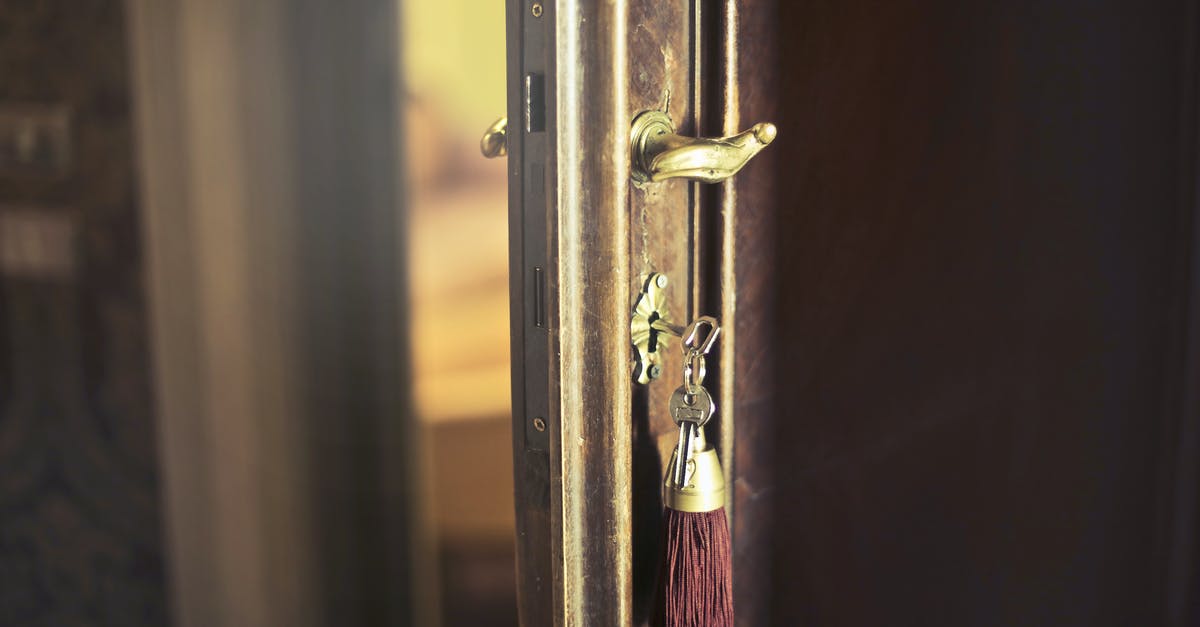 The definition of 'refused entry at the border' [closed] - Key with trinket in shabby door