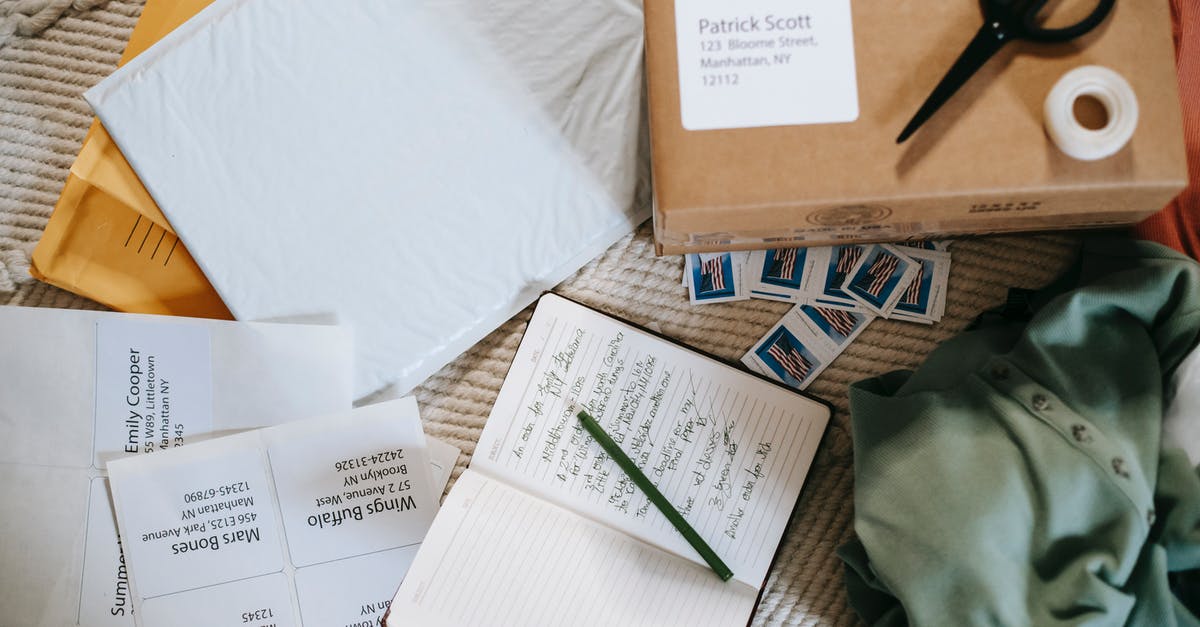 The exit stamp on the Schengen area with a transfer flight - Composition of opened diary carton parcel and postage stamps The exit stamp on the Schengen area with a transfer flight - Composition of opened diary carton parcel and postage stamps