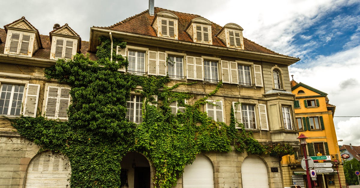 There is no visa centre for Spain in my home city, can I apply to France instead? - Beige 3-storey Building