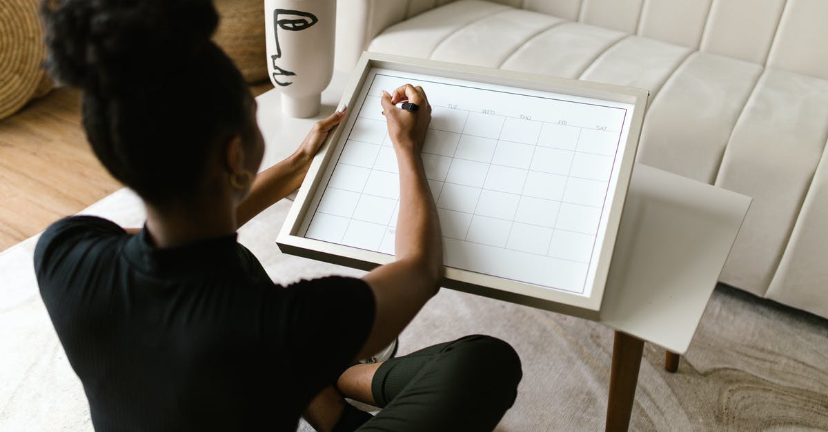 Tier 4 Visa expiring in September 2015. Planning to go Europe in July. Can I apply back at home? - Back View of a Woman Writing on a Calendar Tier 4 Visa expiring in September 2015. Planning to go Europe in July. Can I apply back at home? - Back View of a Woman Writing on a Calendar