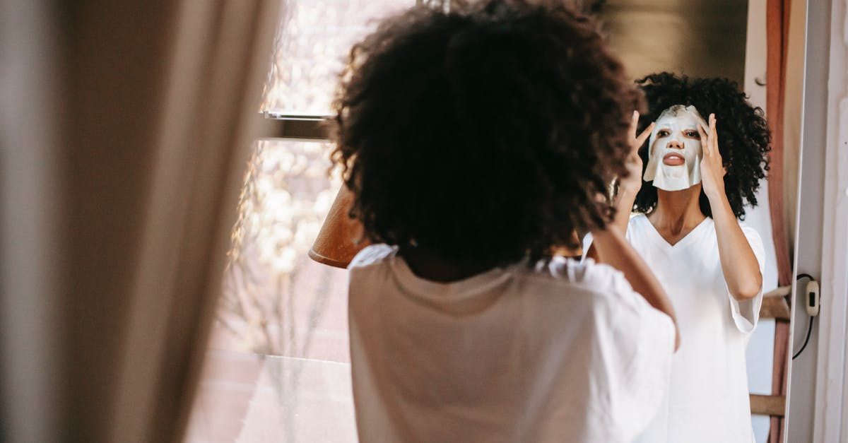 Tier 4 Visa expiring in September 2015. Planning to go Europe in July. Can I apply back at home? - Back view of calm African American woman in casual clothes applying sheet mask and looking at mirror in light room at home in daytime Tier 4 Visa expiring in September 2015. Planning to go Europe in July. Can I apply back at home? - Back view of calm African American woman in casual clothes applying sheet mask and looking at mirror in light room at home in daytime