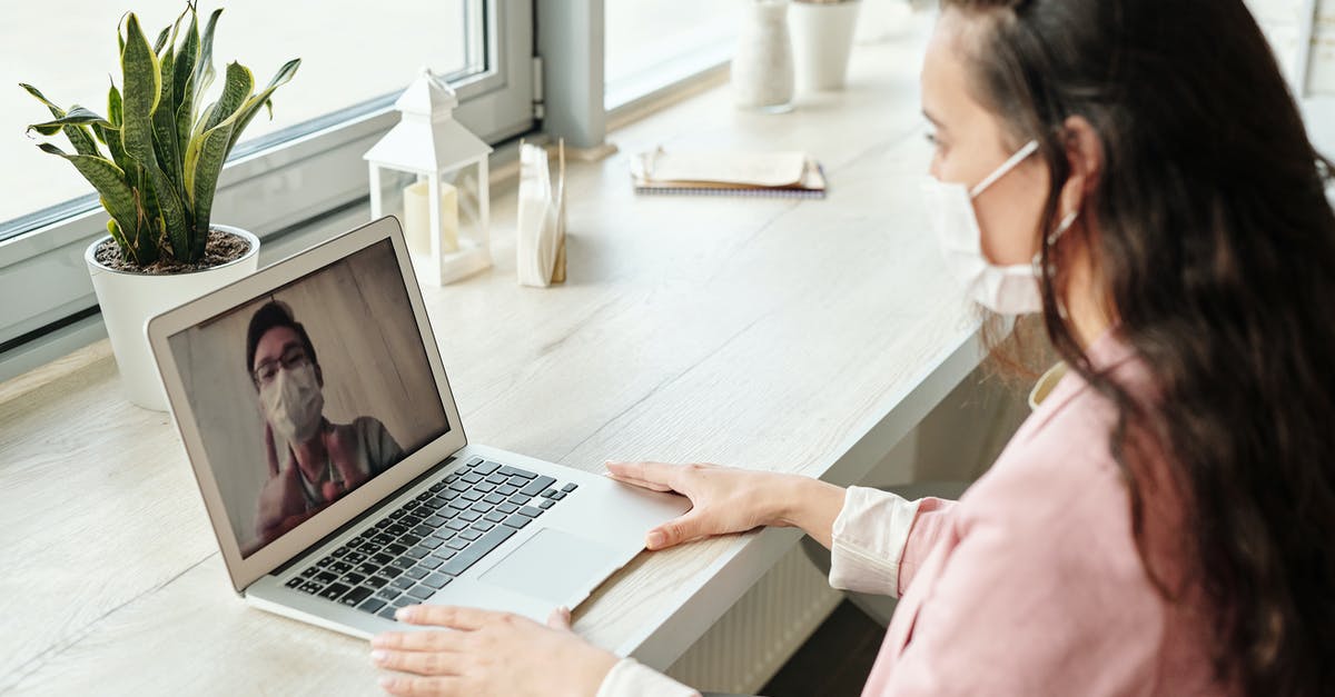 Tight international connection at Atlanta? - Woman Having A Video Call Tight international connection at Atlanta? - Woman Having A Video Call