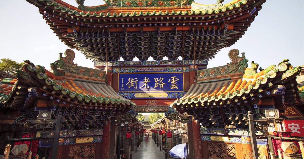 Timatic: Valid China visa in old passport (British) - Tajikistan to China by air? [duplicate] - Old Traditional Chinese Temple Entrance