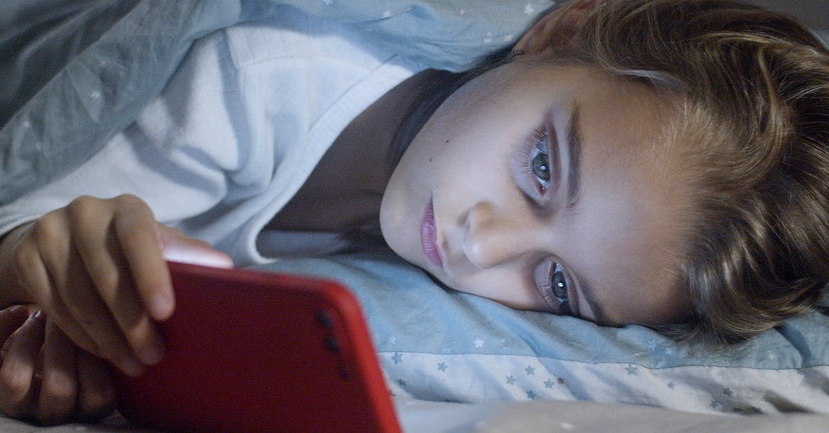 Time between visits without a visa [duplicate] - Girl Using her Phone in Bed