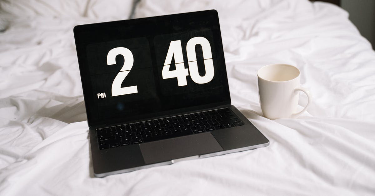 Time needed for PRG-FRA-JFK - Black and Silver Laptop Computer Beside White Ceramic Mug on White Textile Time needed for PRG-FRA-JFK - Black and Silver Laptop Computer Beside White Ceramic Mug on White Textile